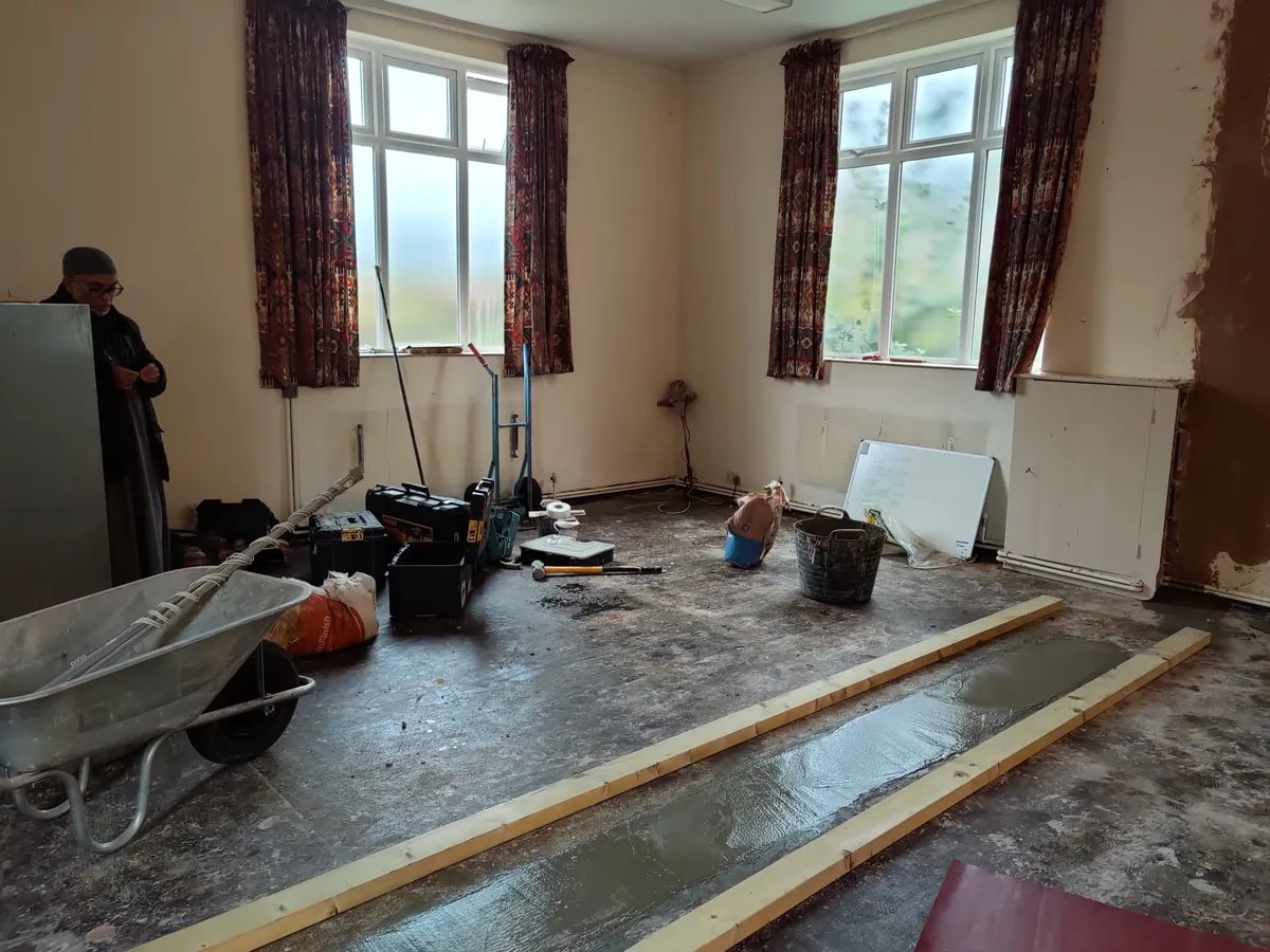 The main hall during refurbishment, after removal of the partition wall